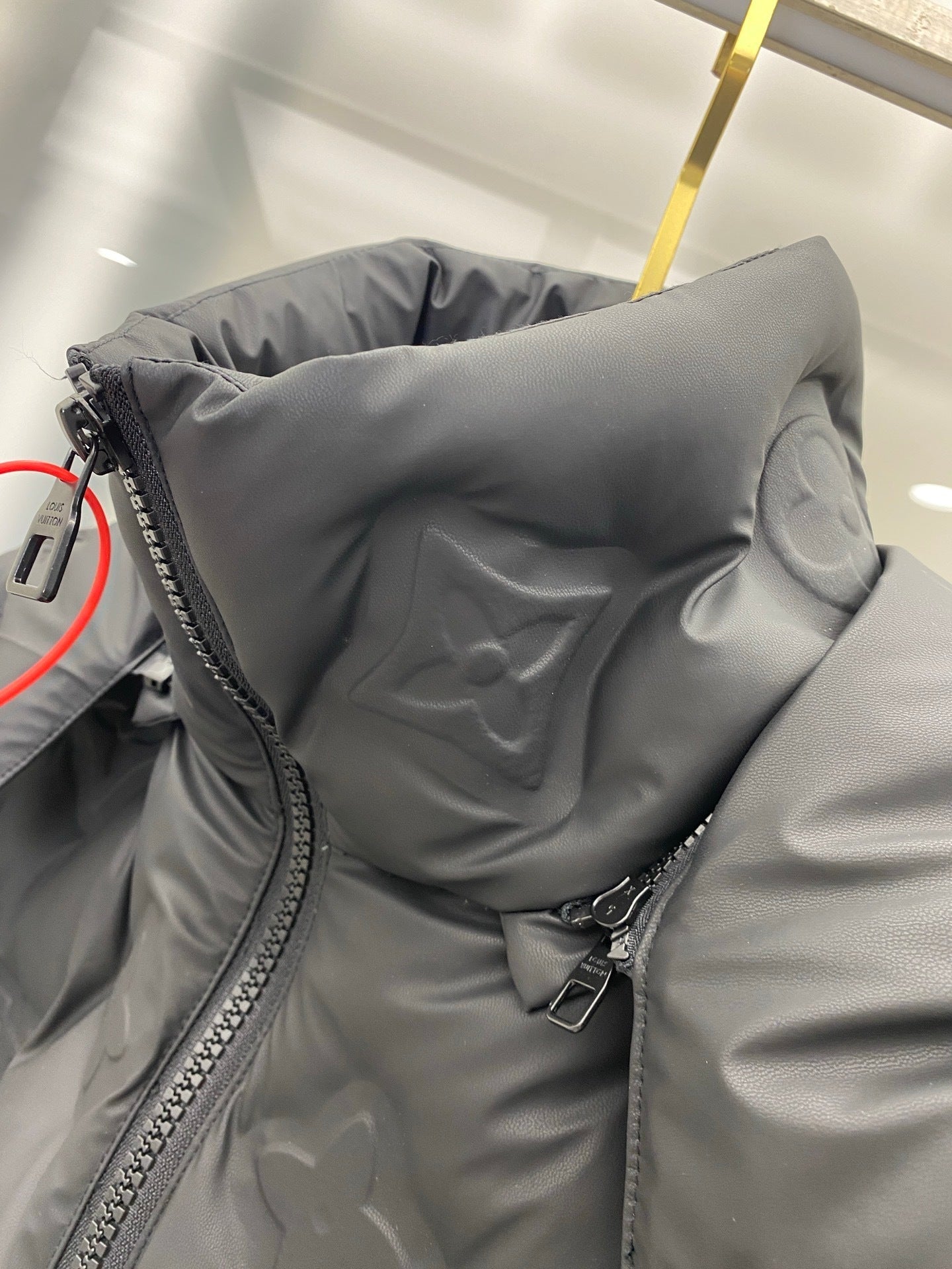 EMBOSSED PUFFER JACKET