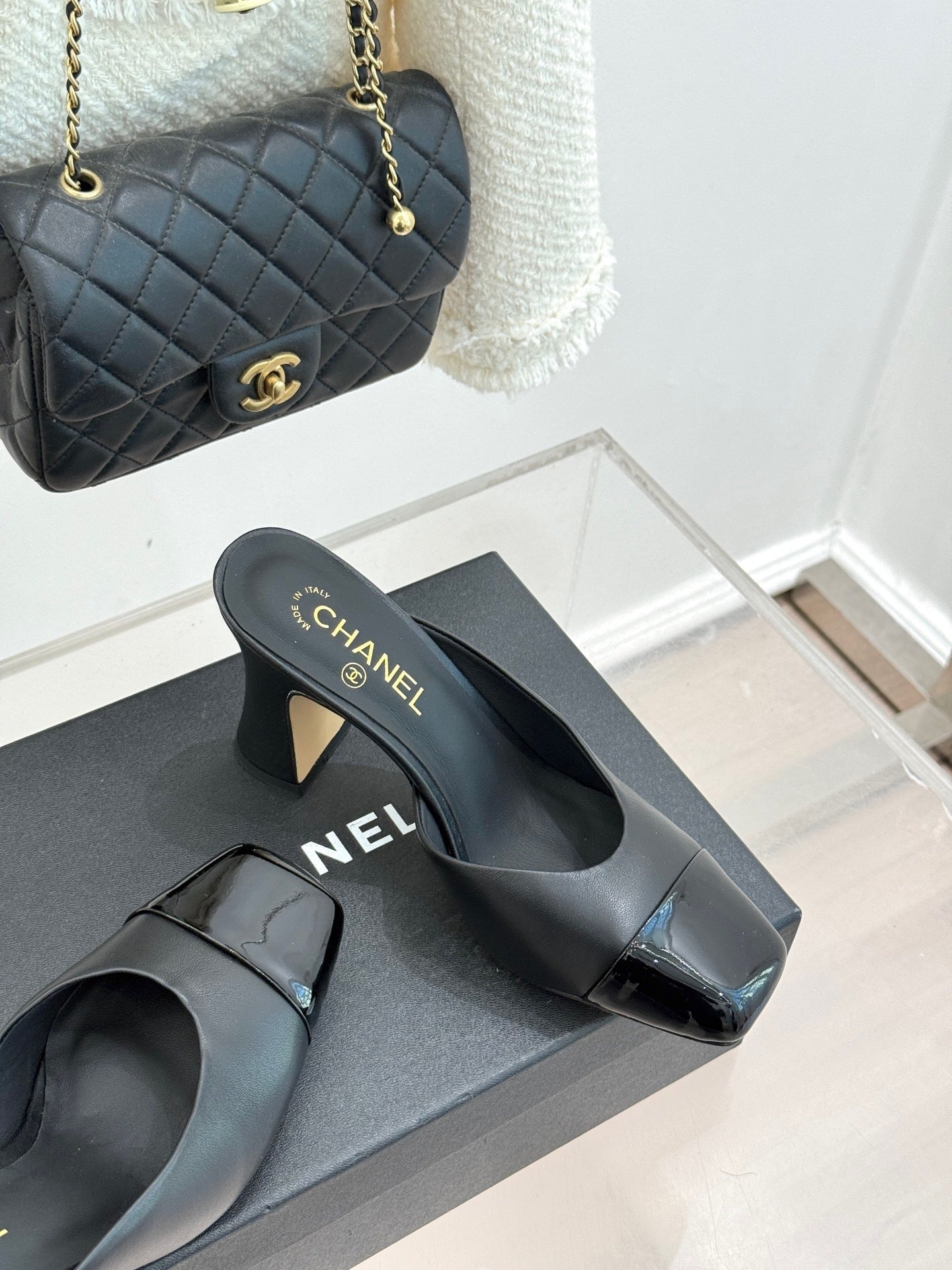 BLACK LEATHER CAP-TOE MULE HEELS WITH GOLD DETAIL