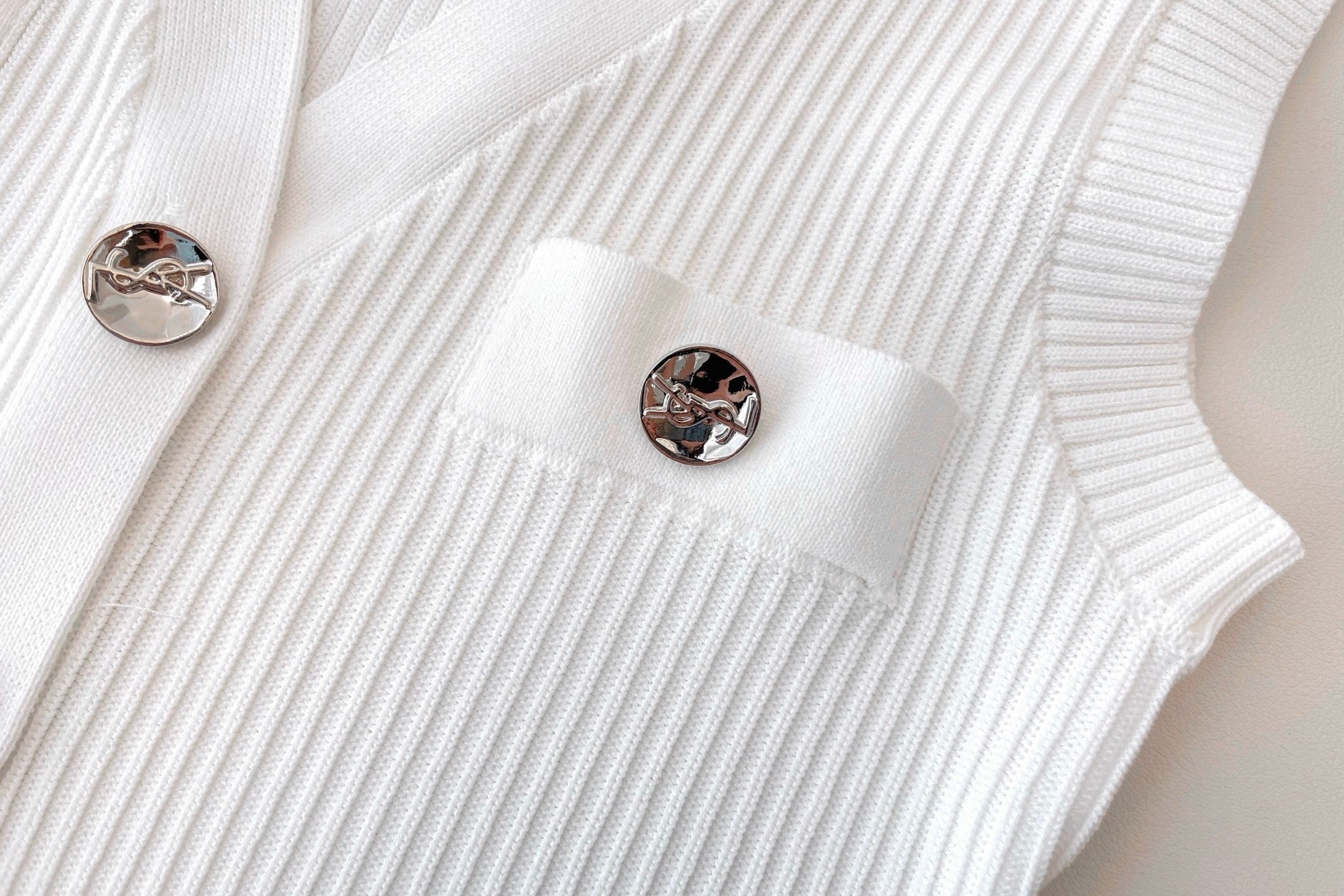 RIBBED PEPLUM KNIT TOP – BUTTON DETAIL