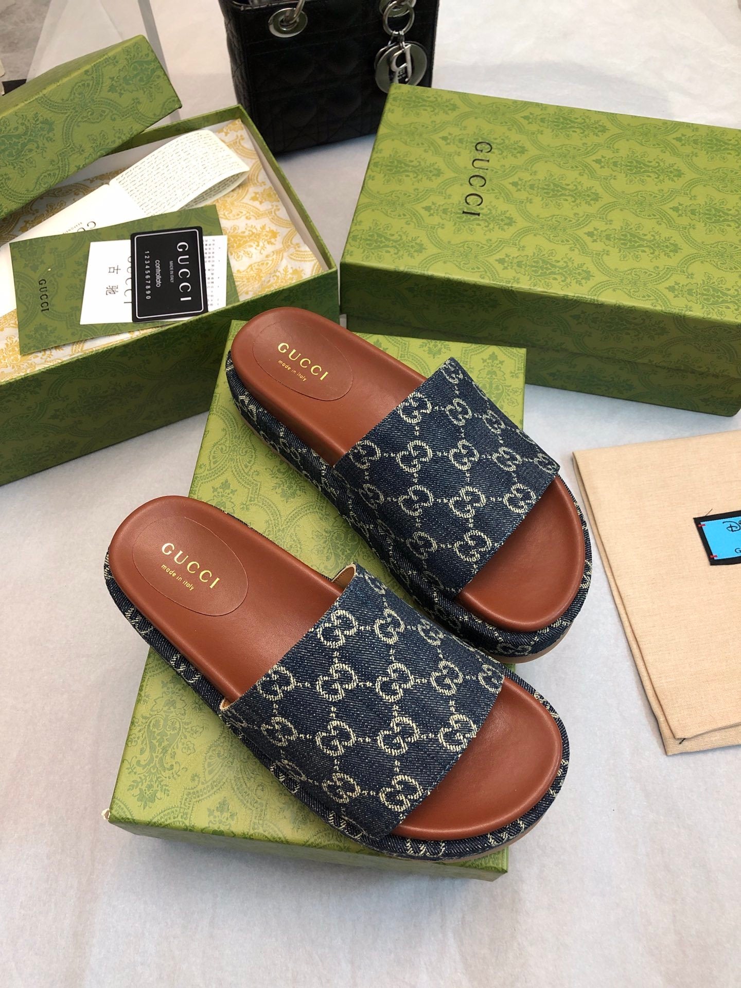 DENIM MONOGRAM PLATFORM SLIDES