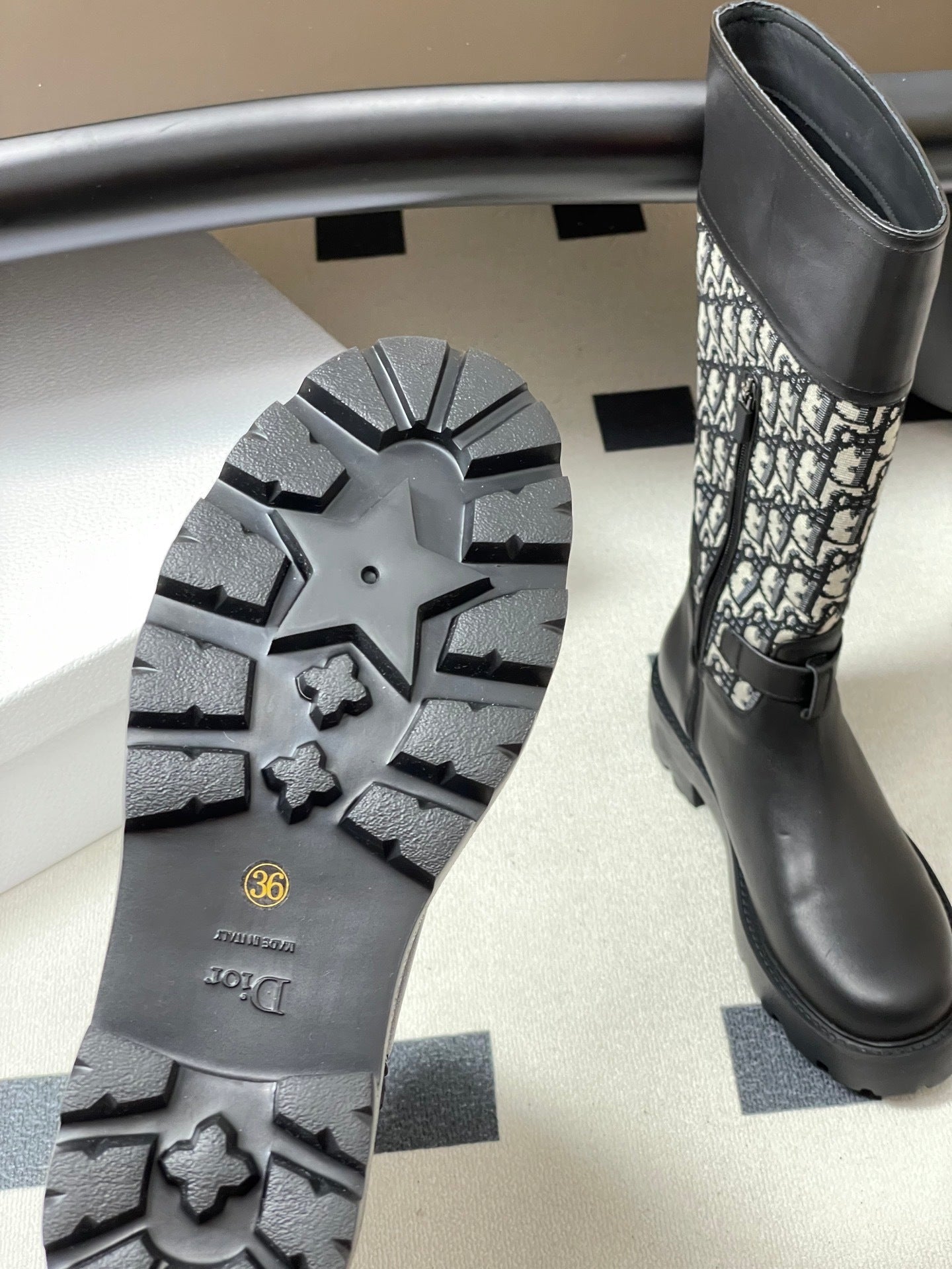 BLACK MID-CALF BOOTS WITH MONOGRAM FABRIC PANEL AND BUCKLE DETAIL