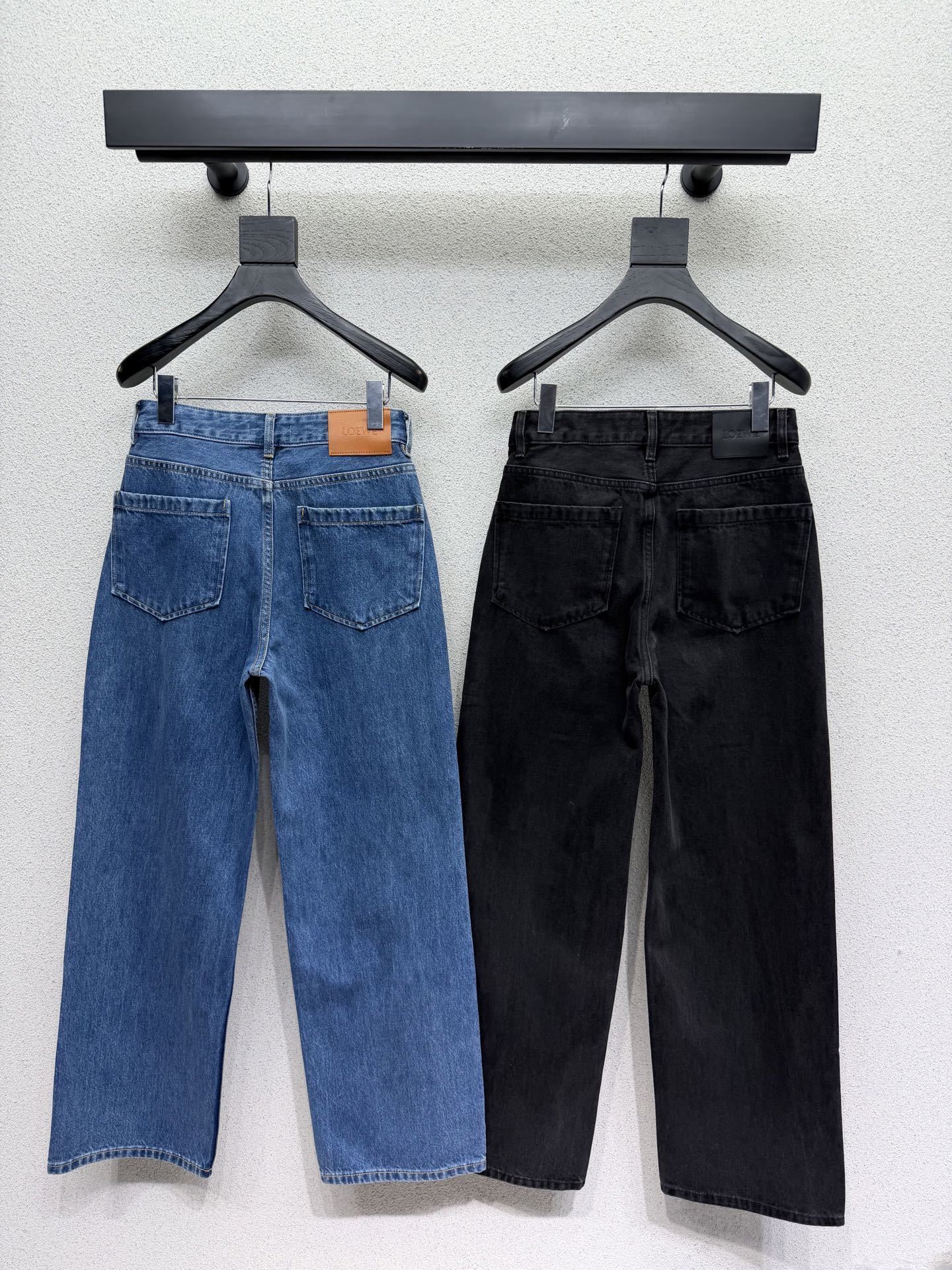 EMBOSSED LOGO RELAXED DENIM JEANS