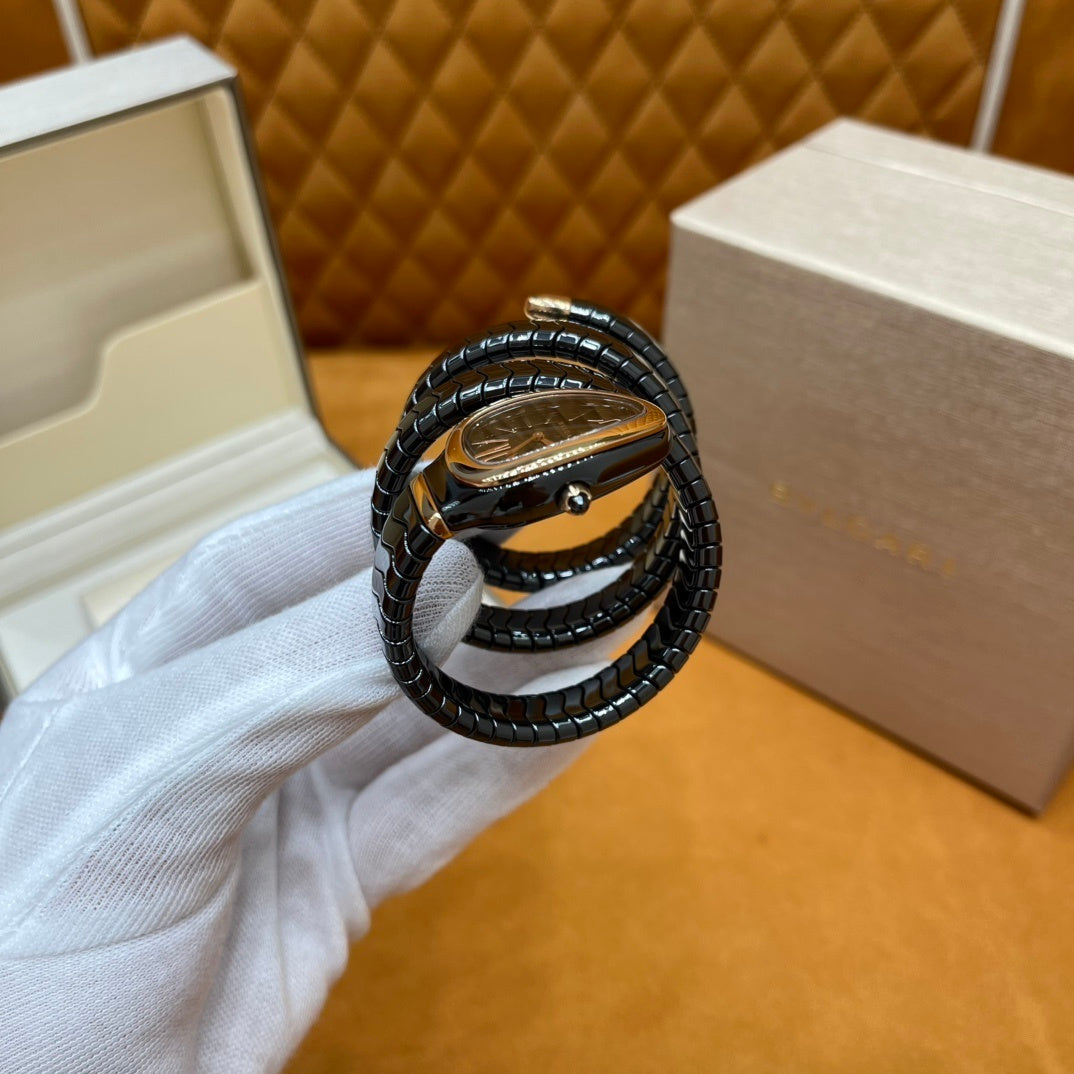 SERPENT WRAP WATCH – BLACK & GOLD ELEGANCE