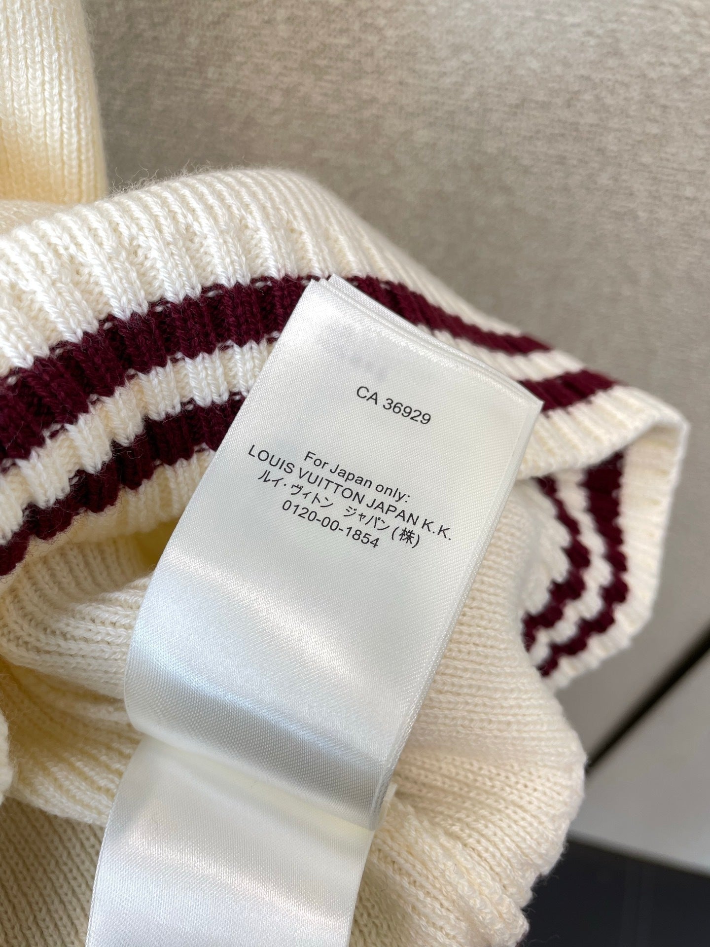 V-NECK KNIT VEST WITH EMBROIDERED CREST