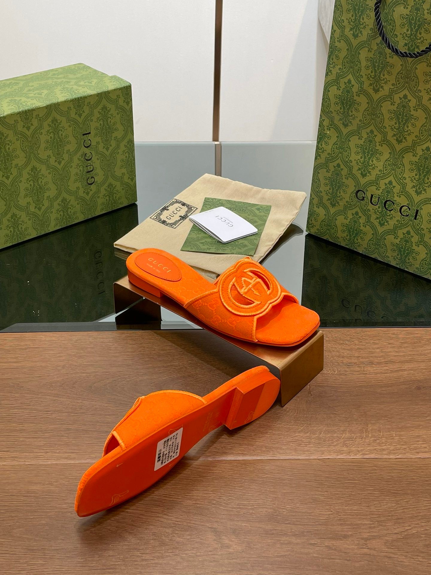 ORANGE EMBOSSED LOGO SLIDES