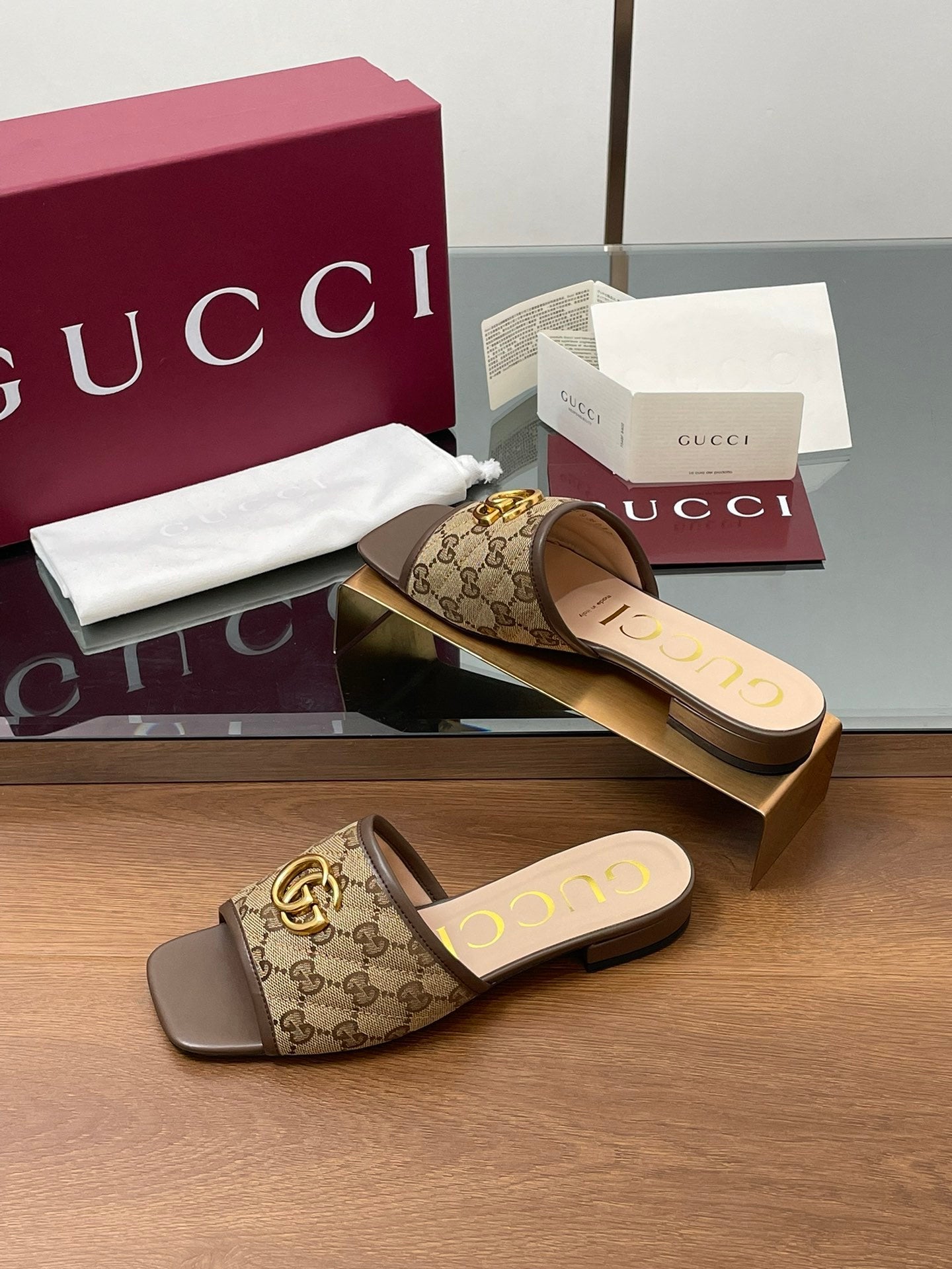 BROWN MONOGRAM FLAT SLIDES