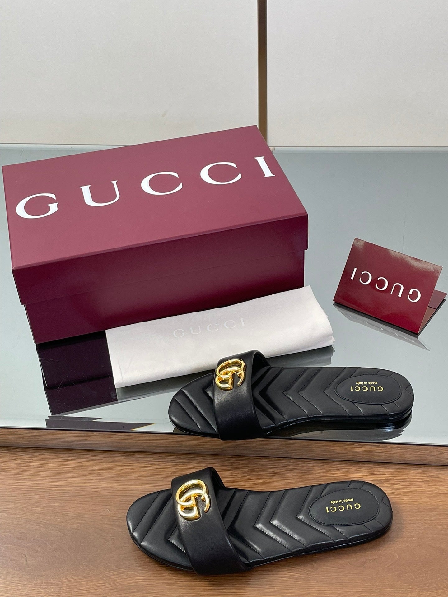 BLACK QUILTED SLIDE SANDALS