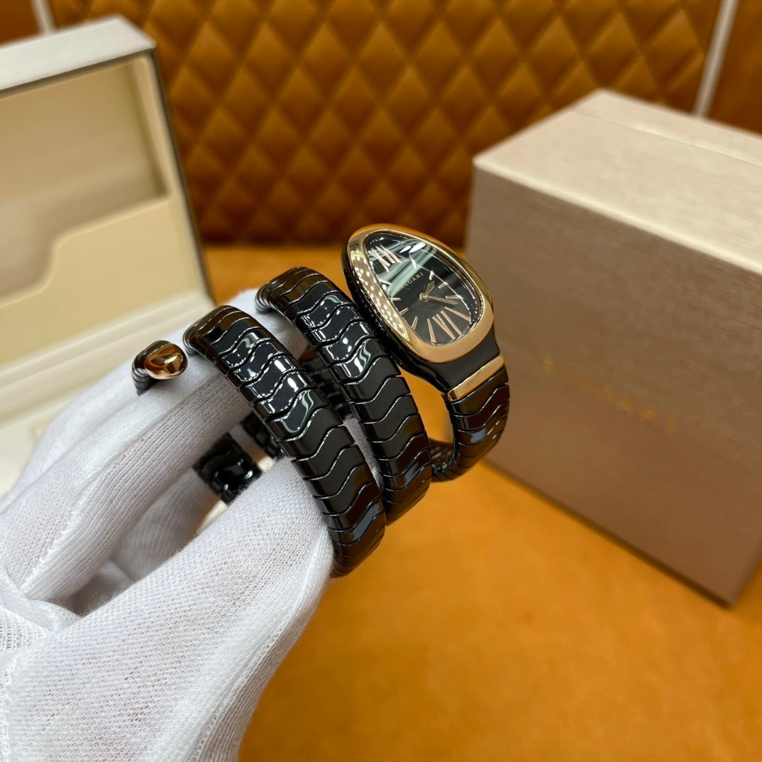 SERPENT WRAP WATCH – BLACK & GOLD ELEGANCE