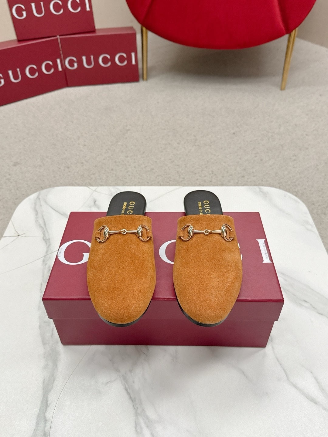 SUEDE SLIP-ON MULES WITH GOLD HORSEBIT DETAIL