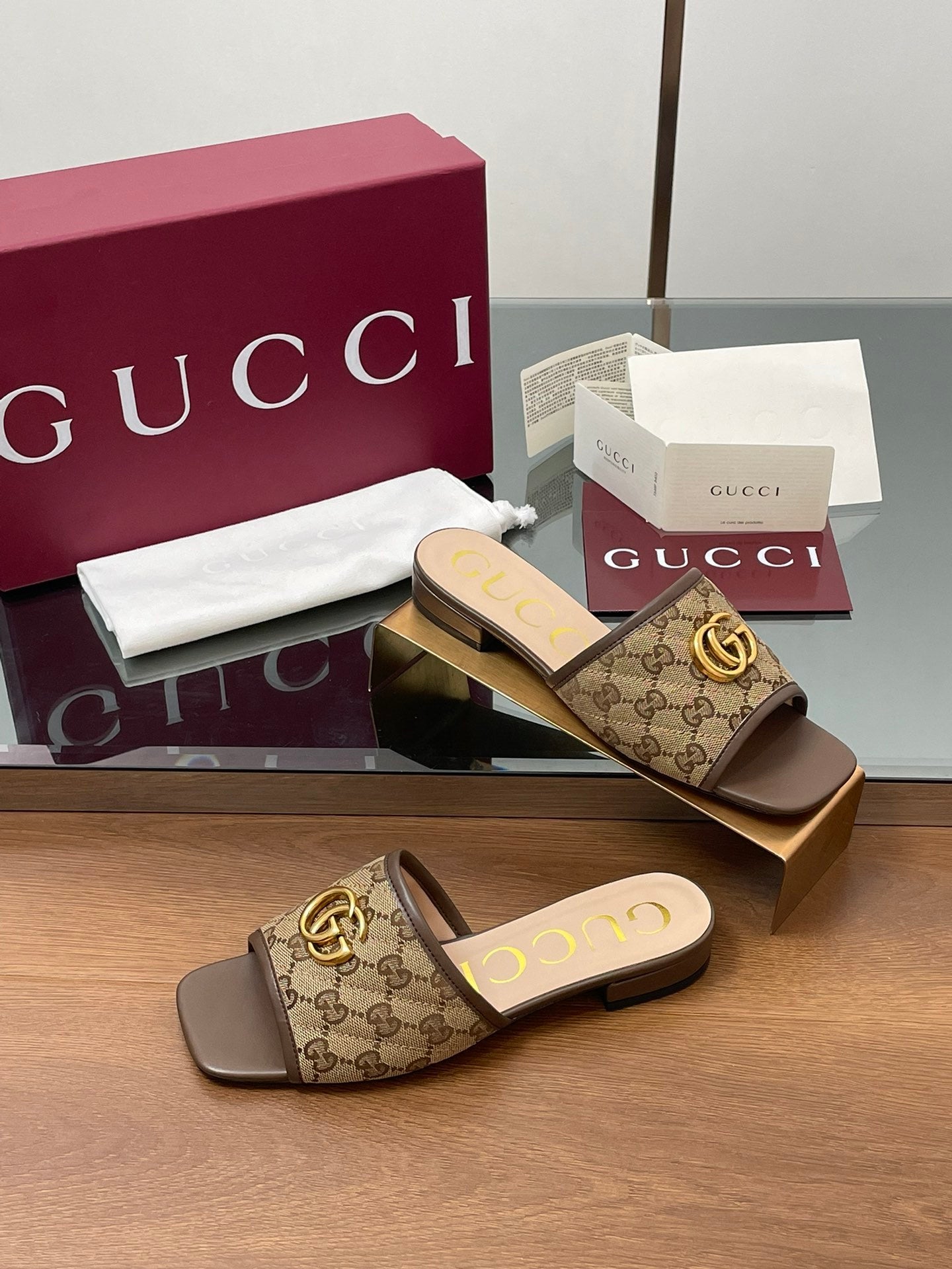 BROWN MONOGRAM FLAT SLIDES