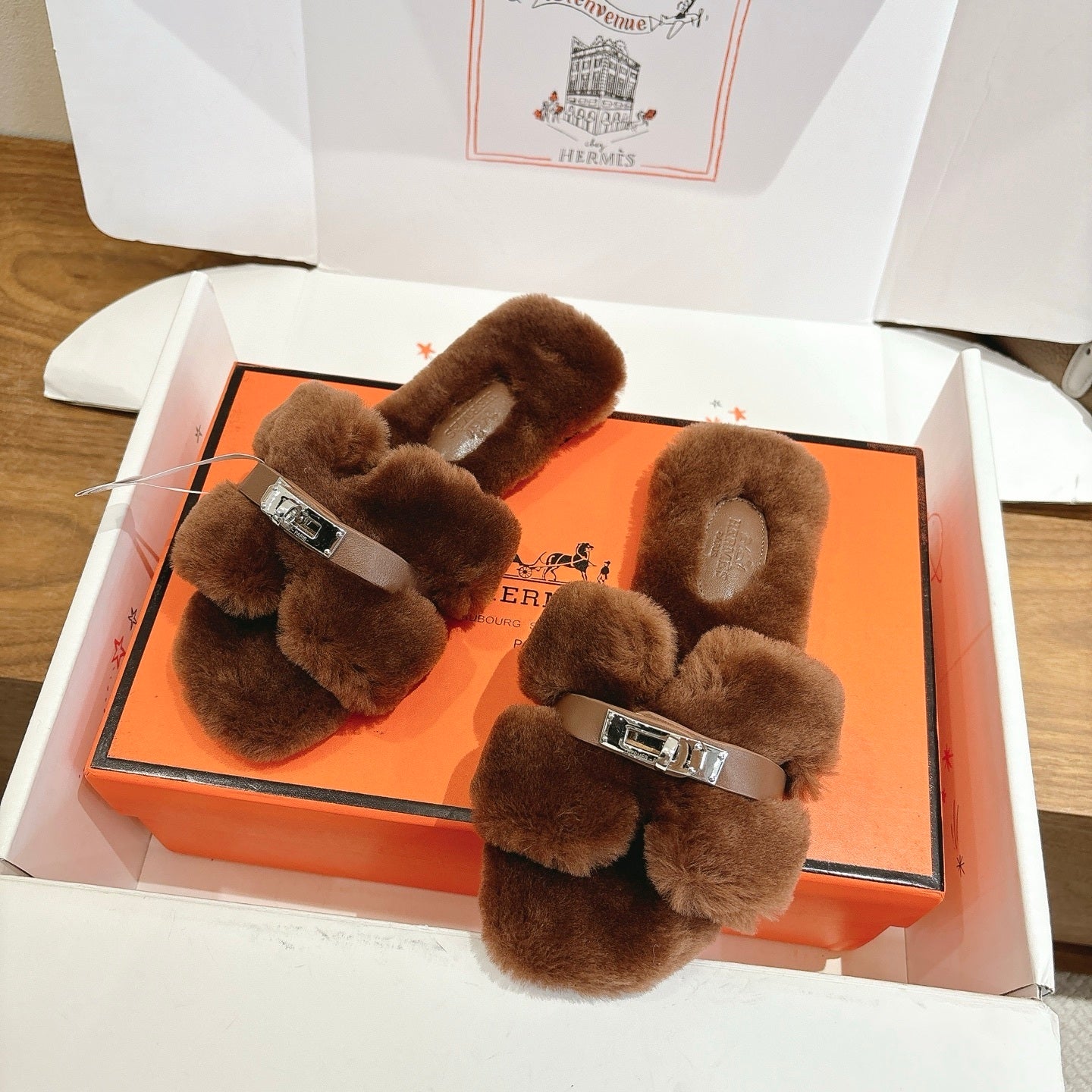 BROWN FAUX FUR MULE SLIPPERS WITH SILVER-TONE ACCENT