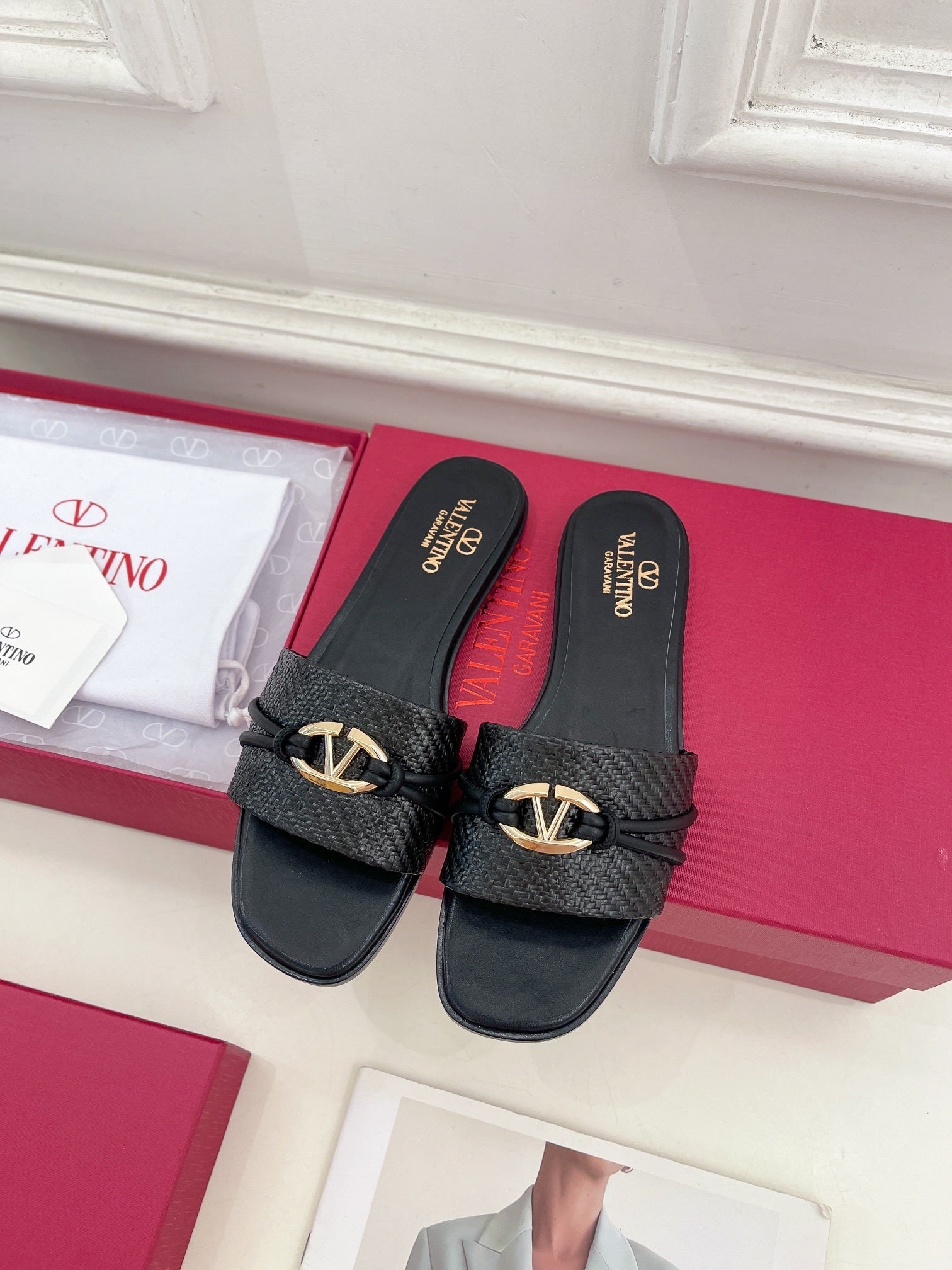 FLAT SLIDE SANDALS – BLACK WOVEN STRAP WITH METAL ACCENT