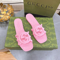 PASTEL PINK RUBBER SLIDE SANDALS WITH ROUND EMBLEM