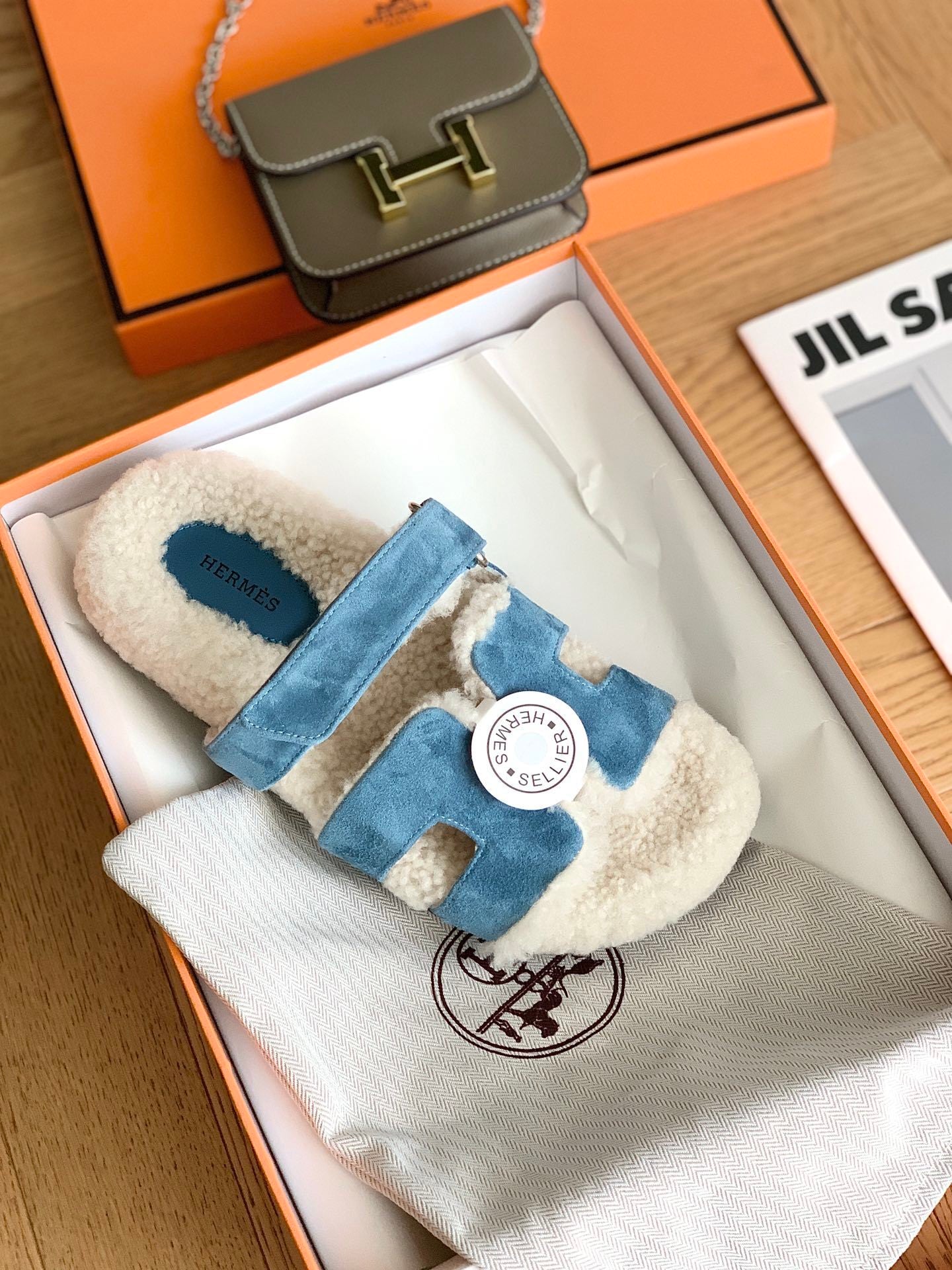 SHEARLING SLIDE SANDALS WITH BLUE SUEDE STRAPS