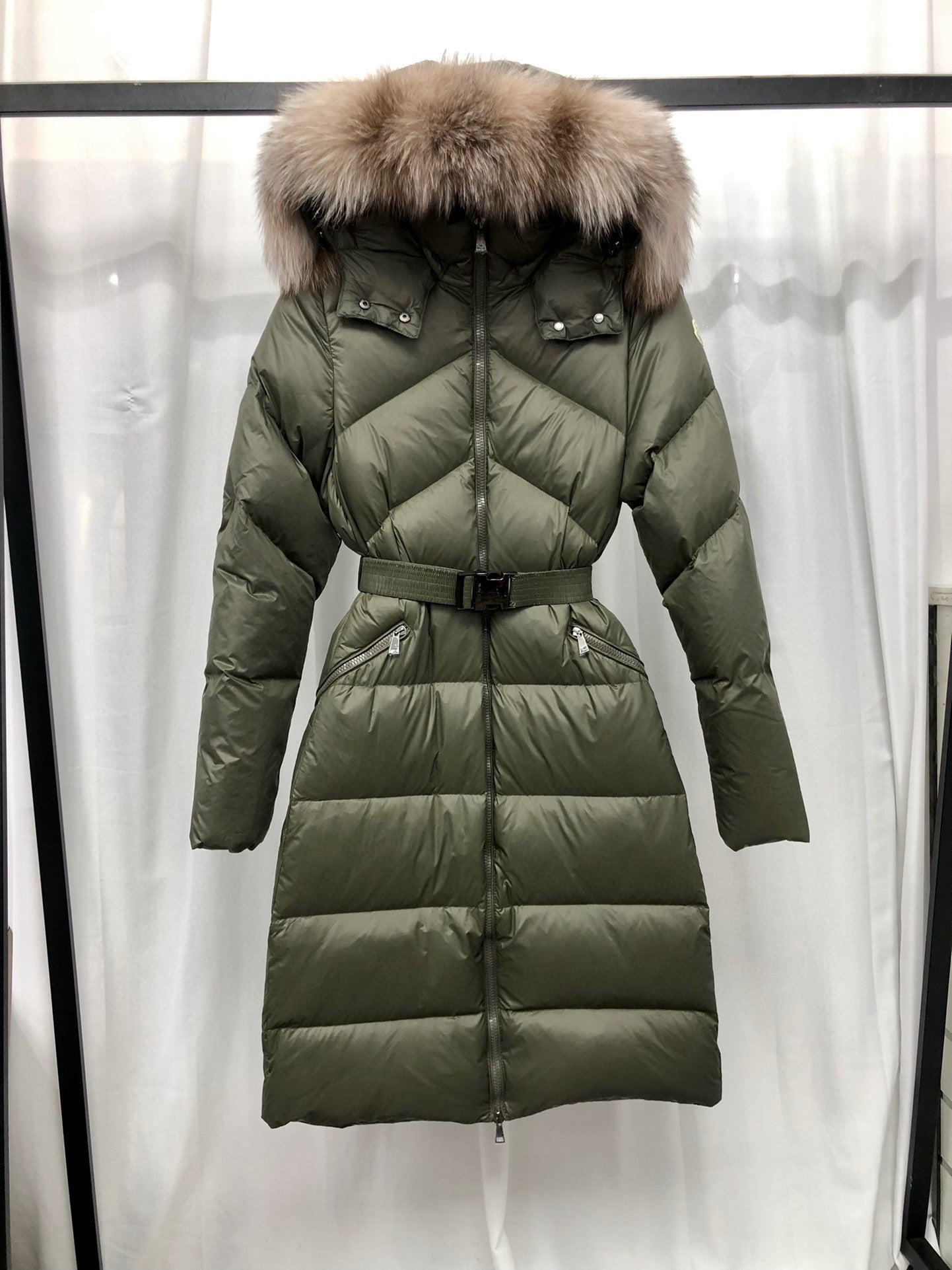 WOMEN’S BELTED LONG QUILTED WINTER COAT WITH FAUX FUR HOOD