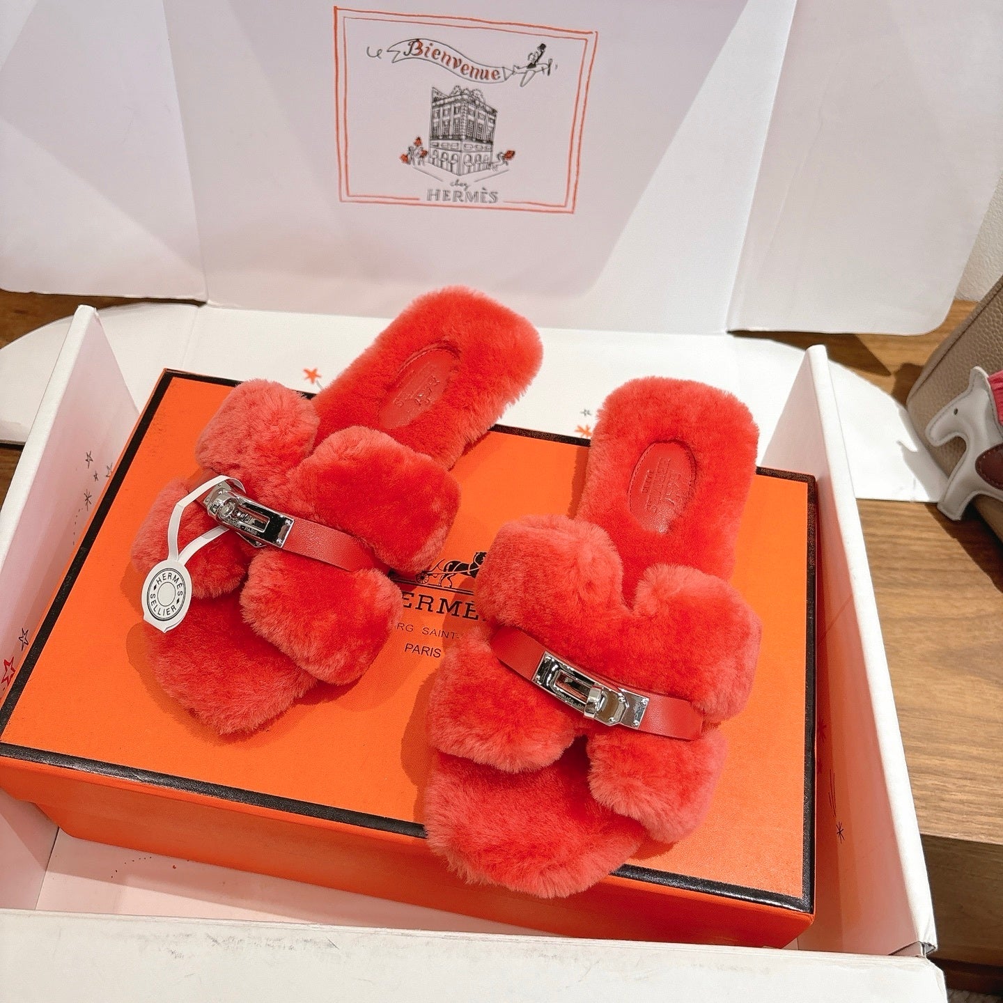 CORAL FAUX FUR MULE SLIPPERS WITH SILVER-TONE ACCENT