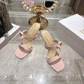 BOW-DETAIL JACQUARD HEELED MULE SANDALS