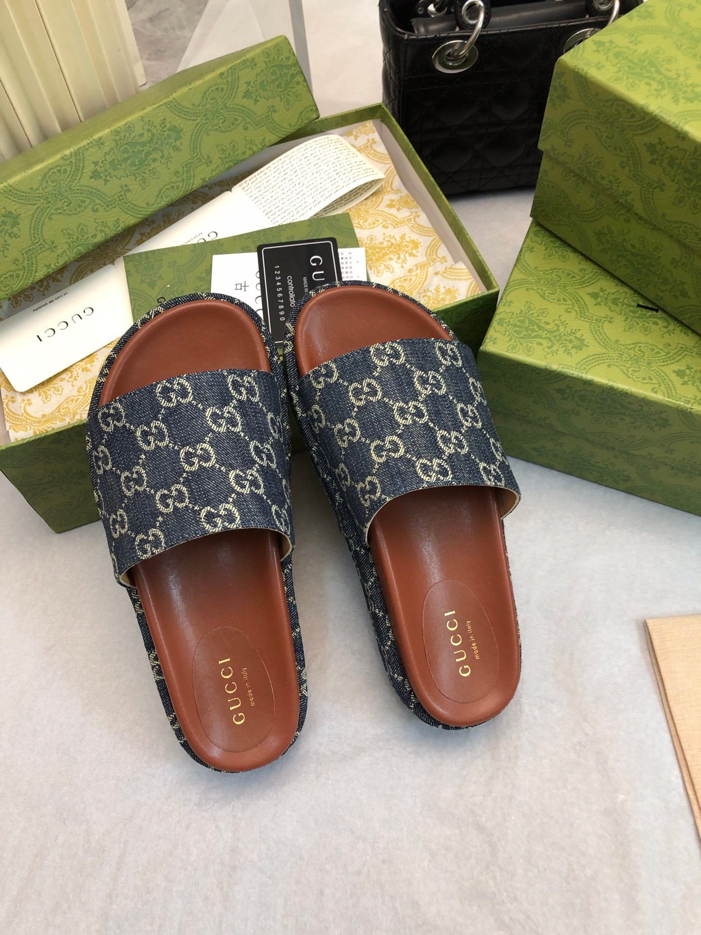 DENIM MONOGRAM PLATFORM SLIDES