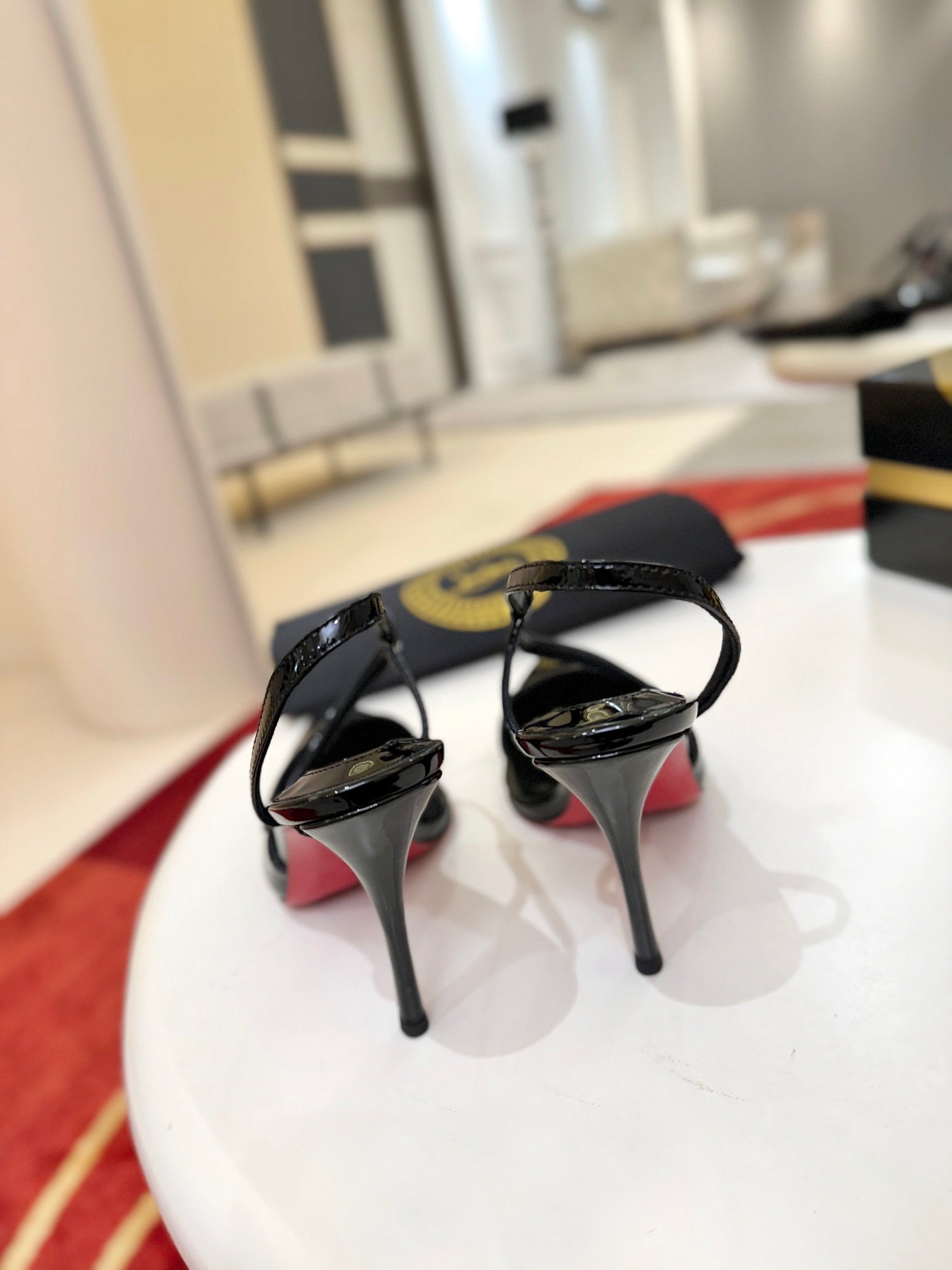 BLACK PATENT STRAPPY POINTED HEELS