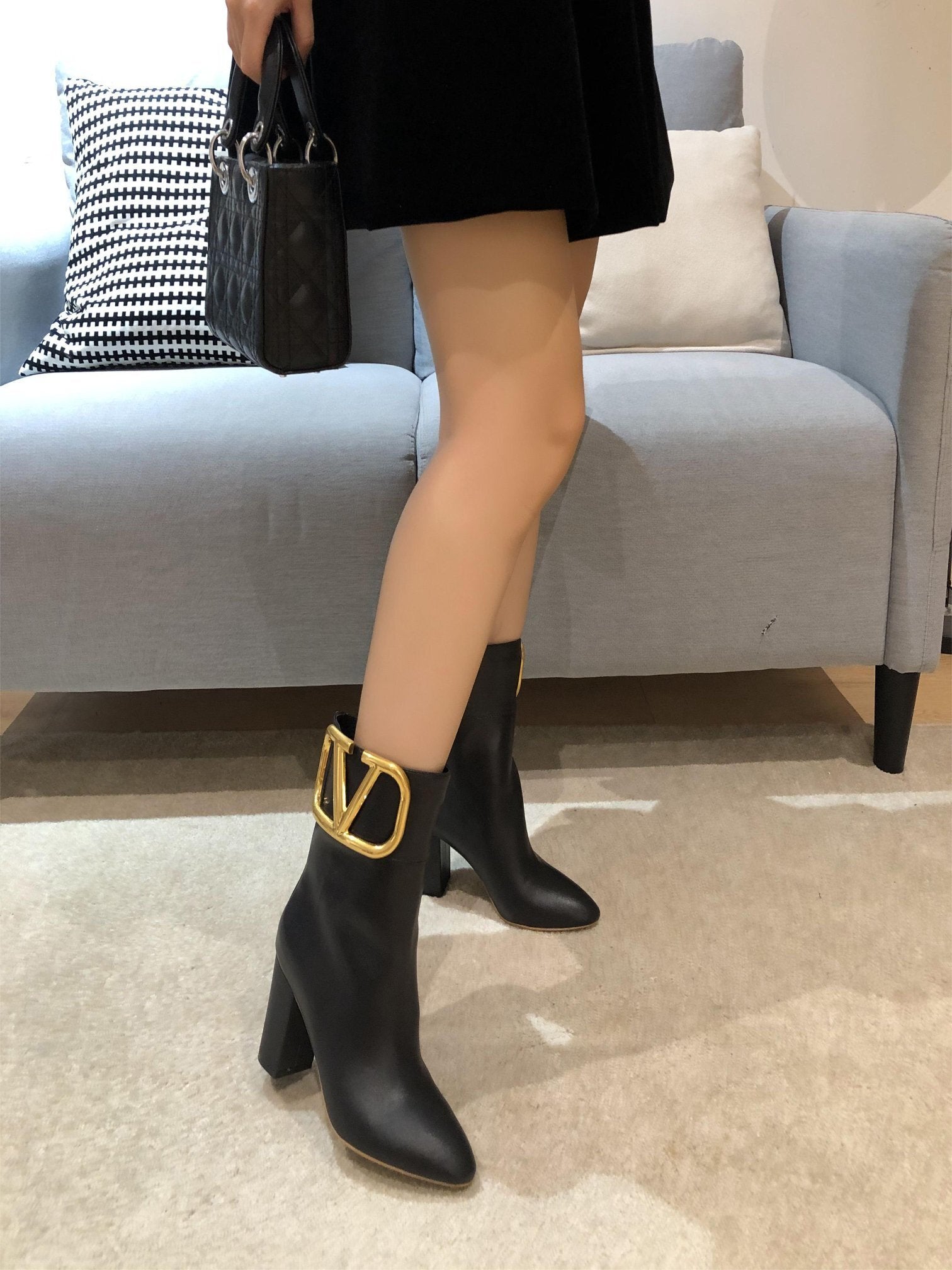 ELEGANT ANKLE BOOTS WITH STATEMENT GOLD V DETAIL