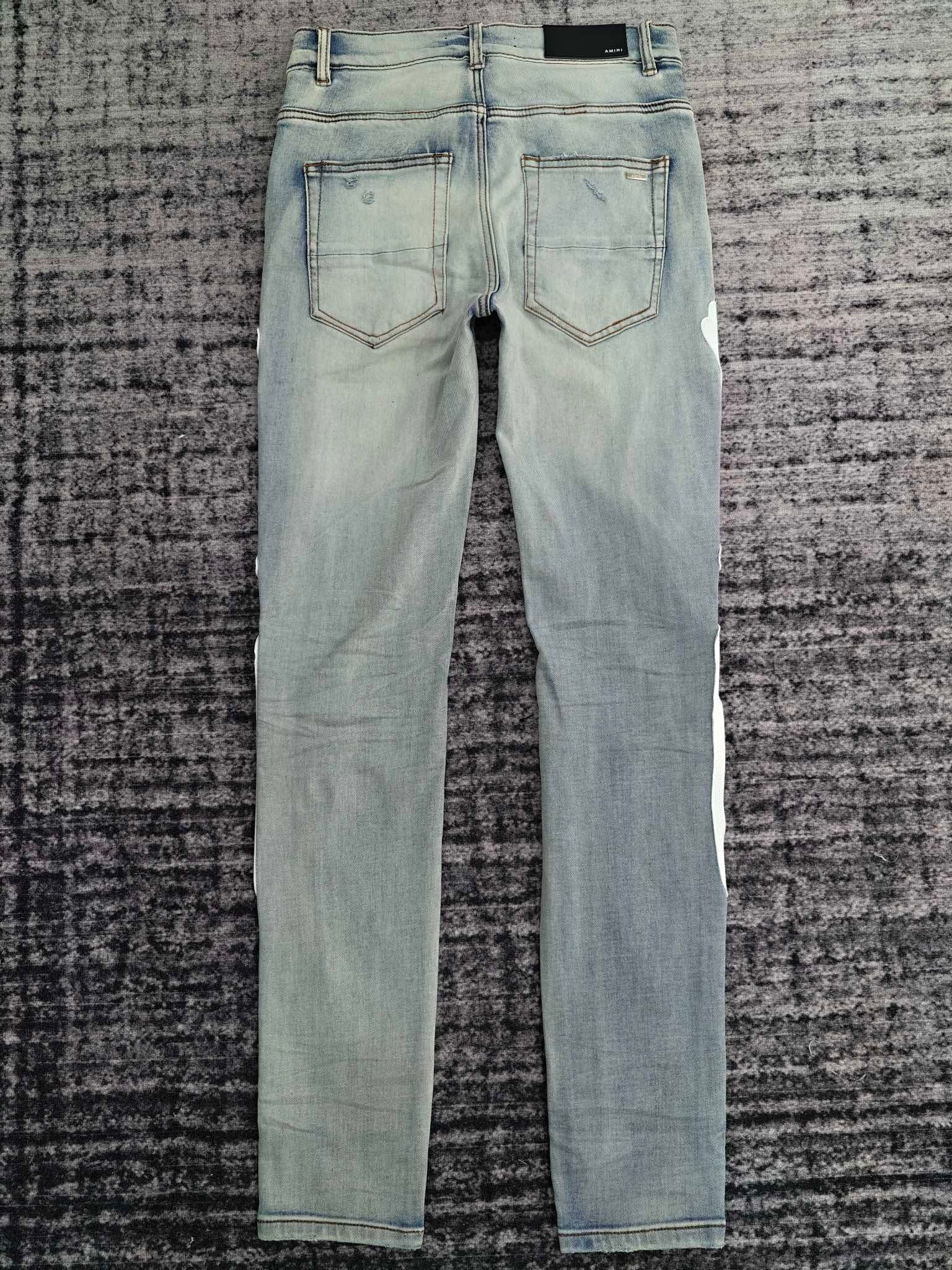 SKELETON APPLIQUÉ DISTRESSED SKINNY JEANS