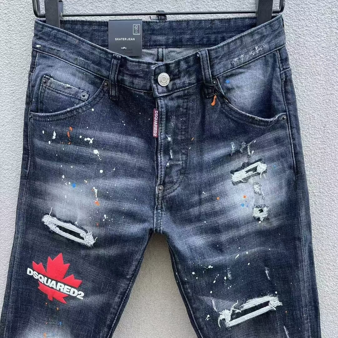 DISTRESSED PAINT SPLATTER SLIM JEANS WITH MAPLE GRAPHIC