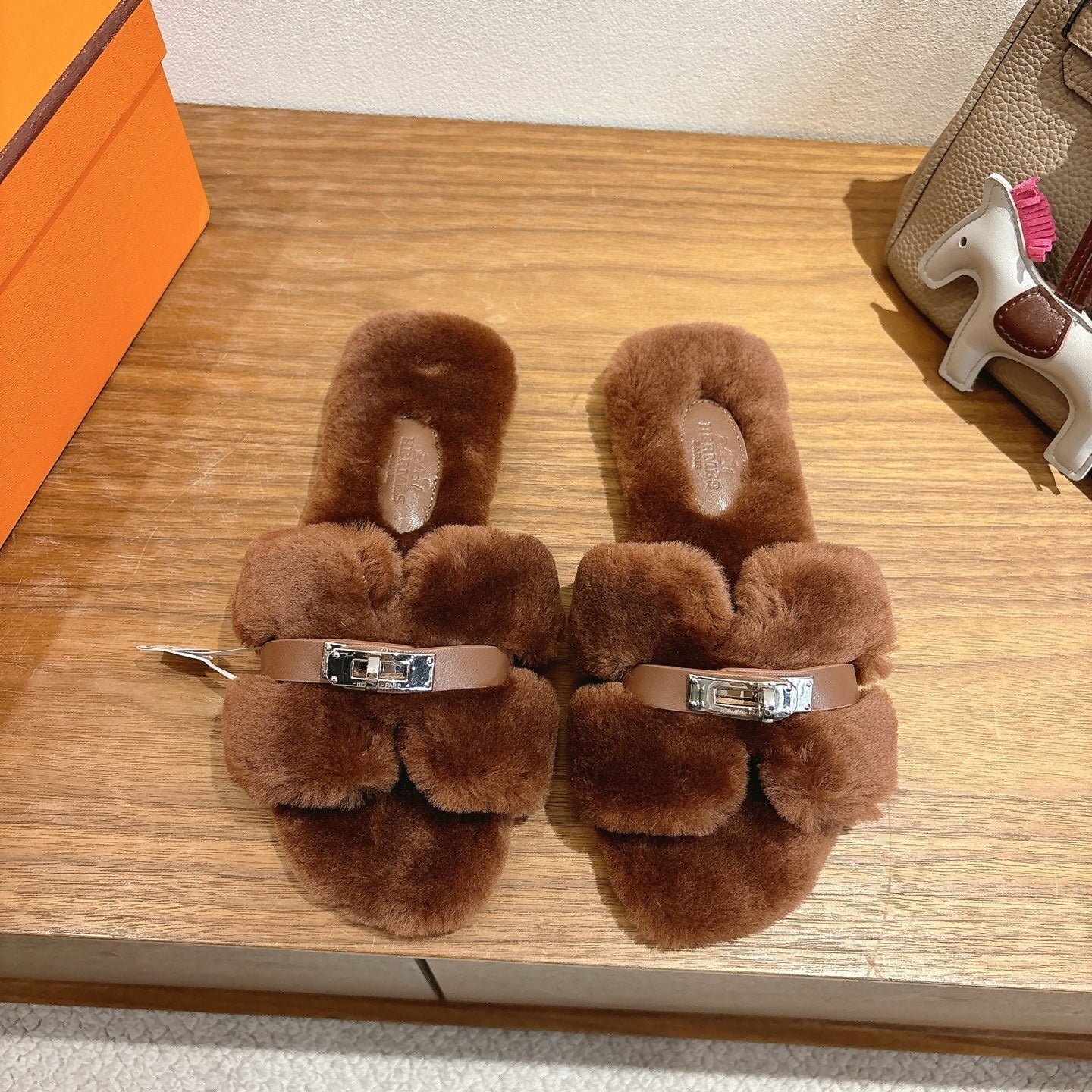 BROWN FAUX FUR MULE SLIPPERS WITH SILVER-TONE ACCENT