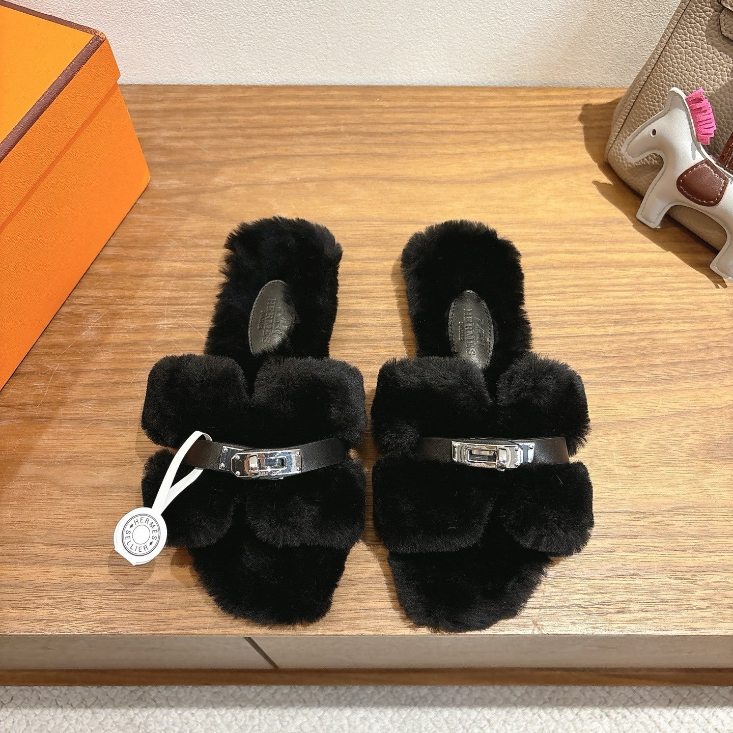 BLACK FAUX FUR MULE SLIPPERS WITH SILVER-TONE ACCENT