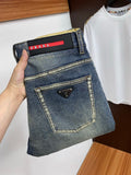 VINTAGE WASH LOGO PLAQUE DENIM JEANS