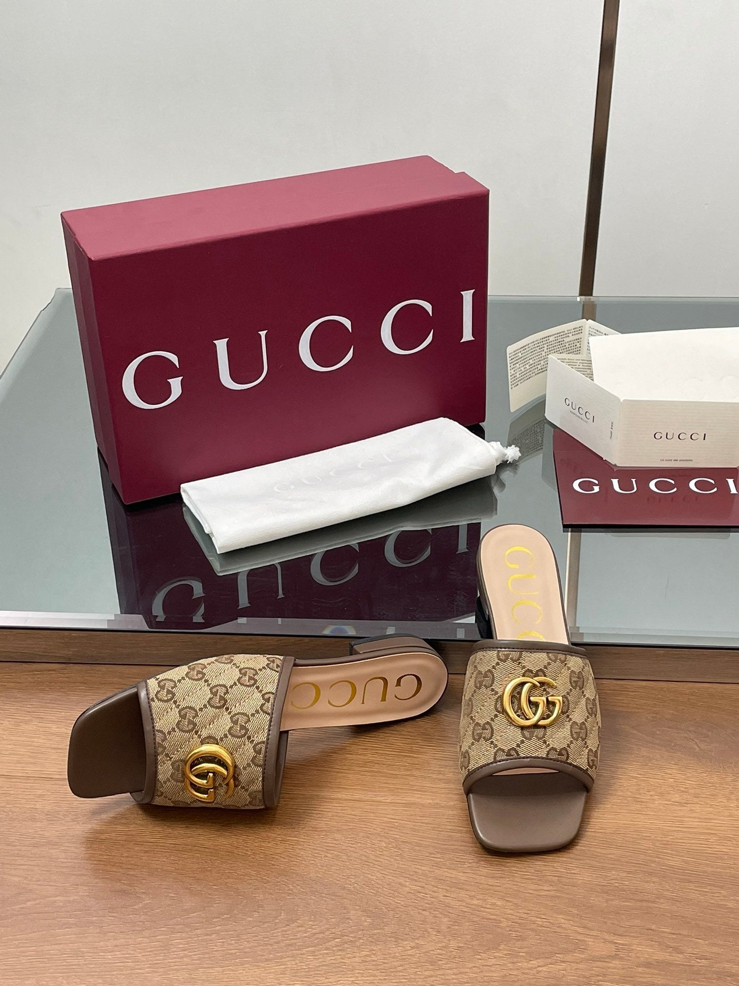 BROWN MONOGRAM FLAT SLIDES