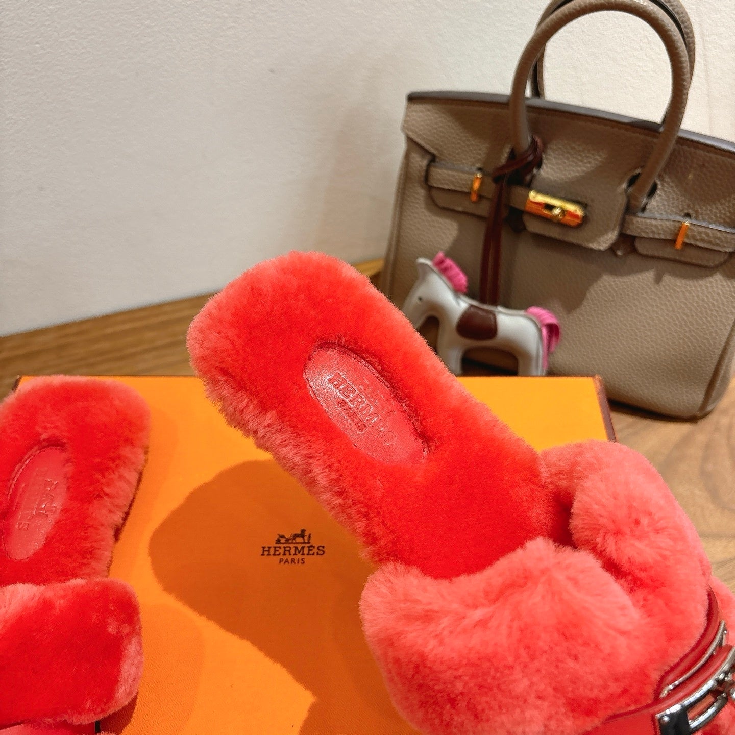 CORAL FAUX FUR MULE SLIPPERS WITH SILVER-TONE ACCENT