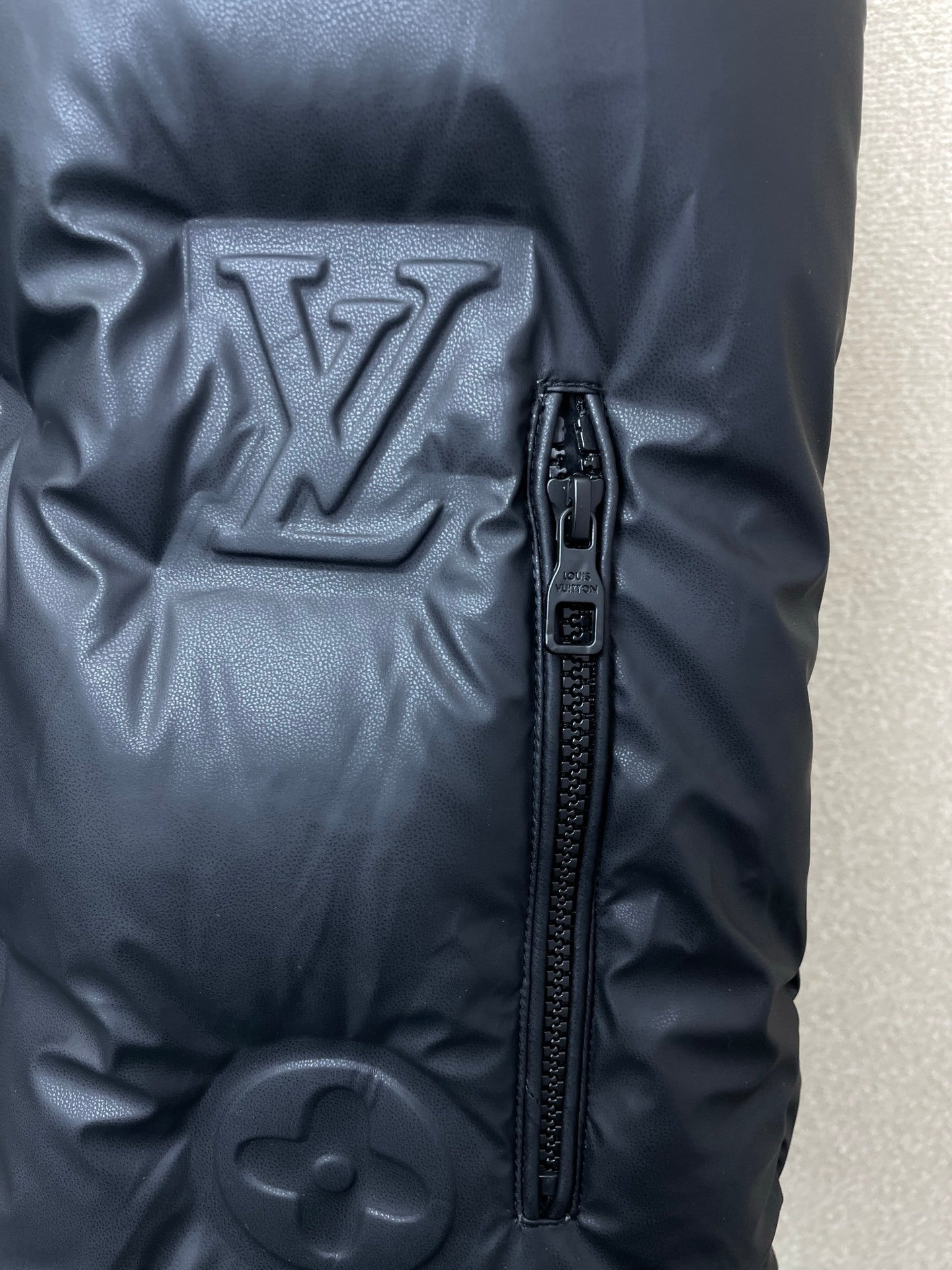 EMBOSSED PADDED HOODED VEST