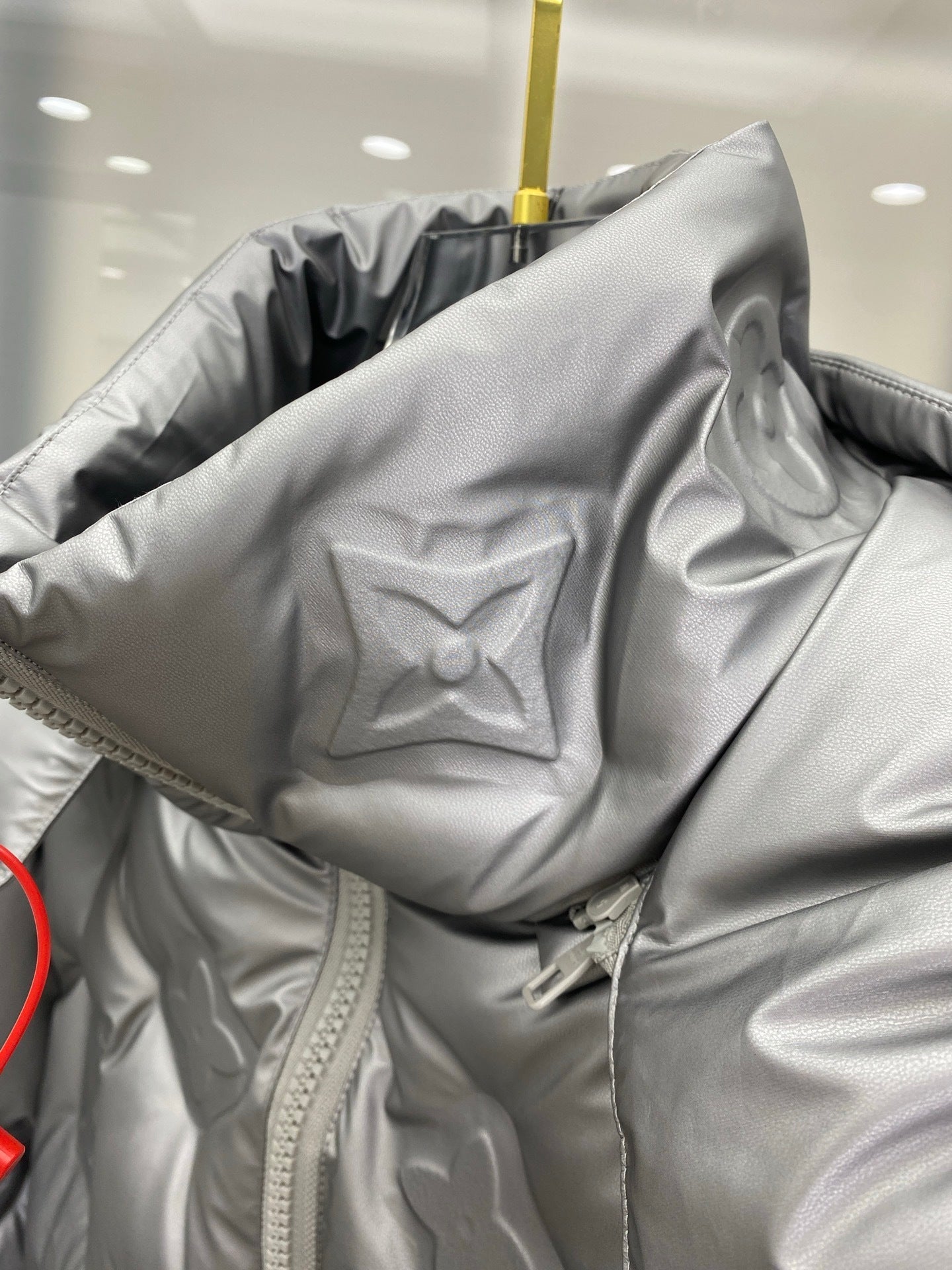 EMBOSSED PUFFER JACKET