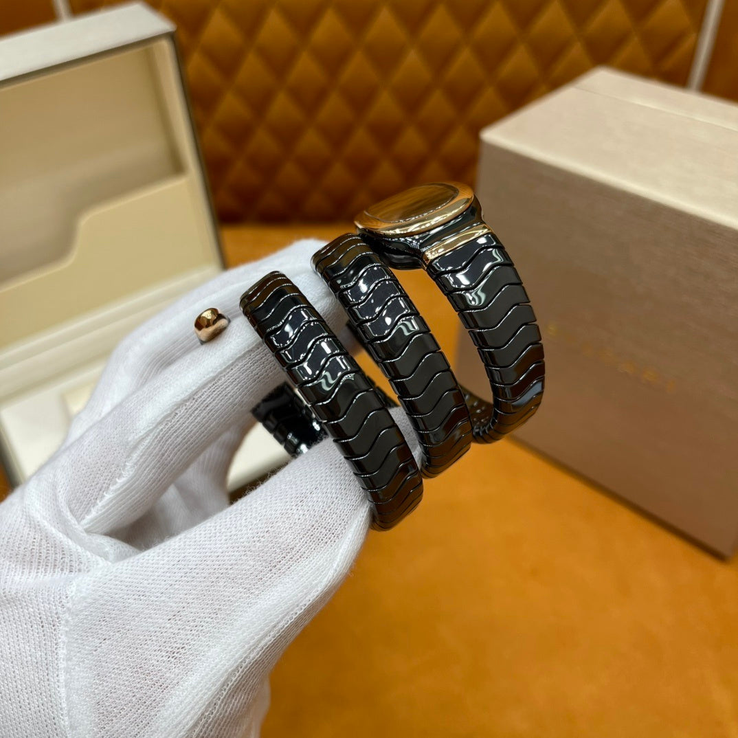 SERPENT WRAP WATCH – BLACK & GOLD ELEGANCE