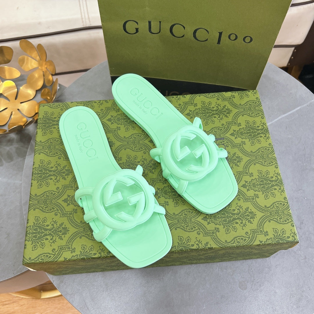 MINT GREEN RUBBER SLIDE SANDALS WITH ROUND EMBLEM