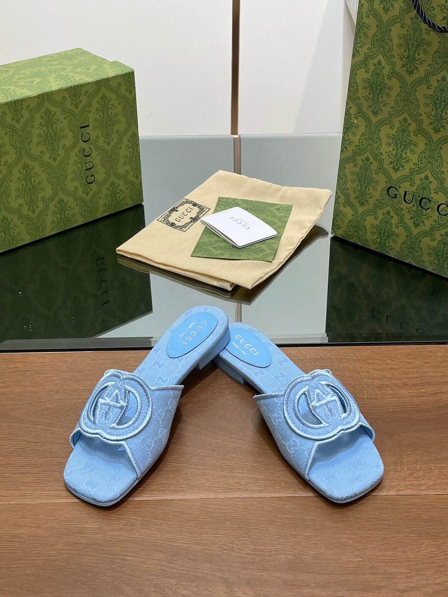 BLUE EMBOSSED LOGO SLIDES