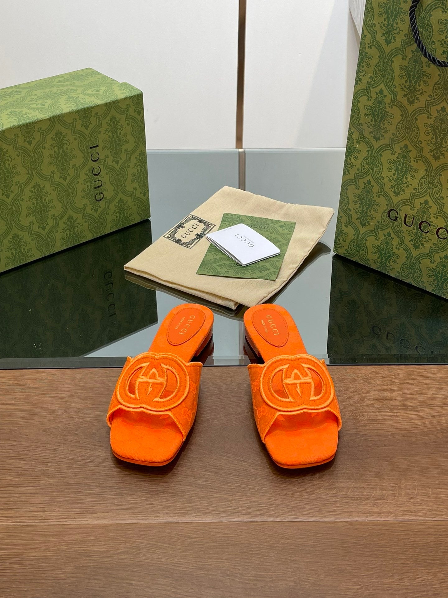 ORANGE EMBOSSED LOGO SLIDES