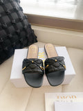 BLACK QUILTED BOW SLIDE SANDALS