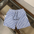 MONOGRAM SWIM SHORTS – WHITE & BLUE