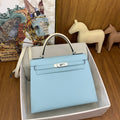 LUXURY BABY BLUE LEATHER TOP HANDLE HANDBAG