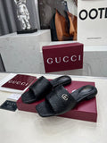 BLACK EMBOSSED LOGO SLIDE SANDALS WITH METAL DETAIL