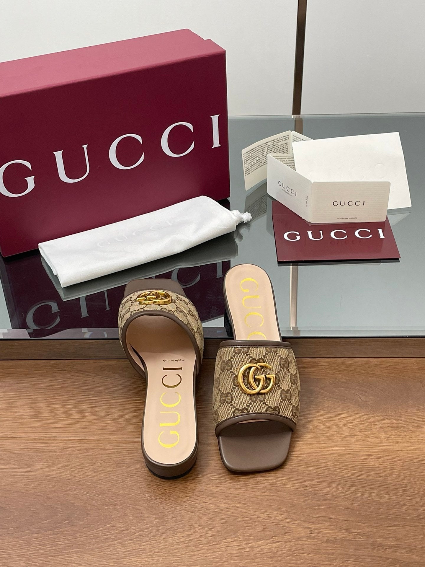 BROWN MONOGRAM FLAT SLIDES