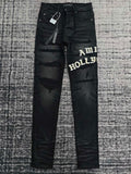 DISTRESSED LOGO APPLIQUÉ SKINNY JEANS