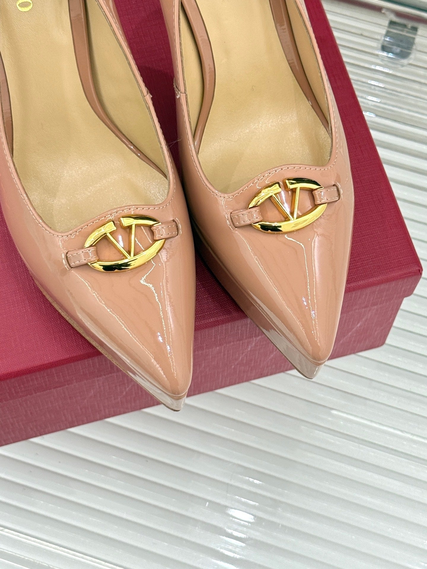 BLUSH PATENT PLATFORM PUMPS WITH GOLD ACCENT