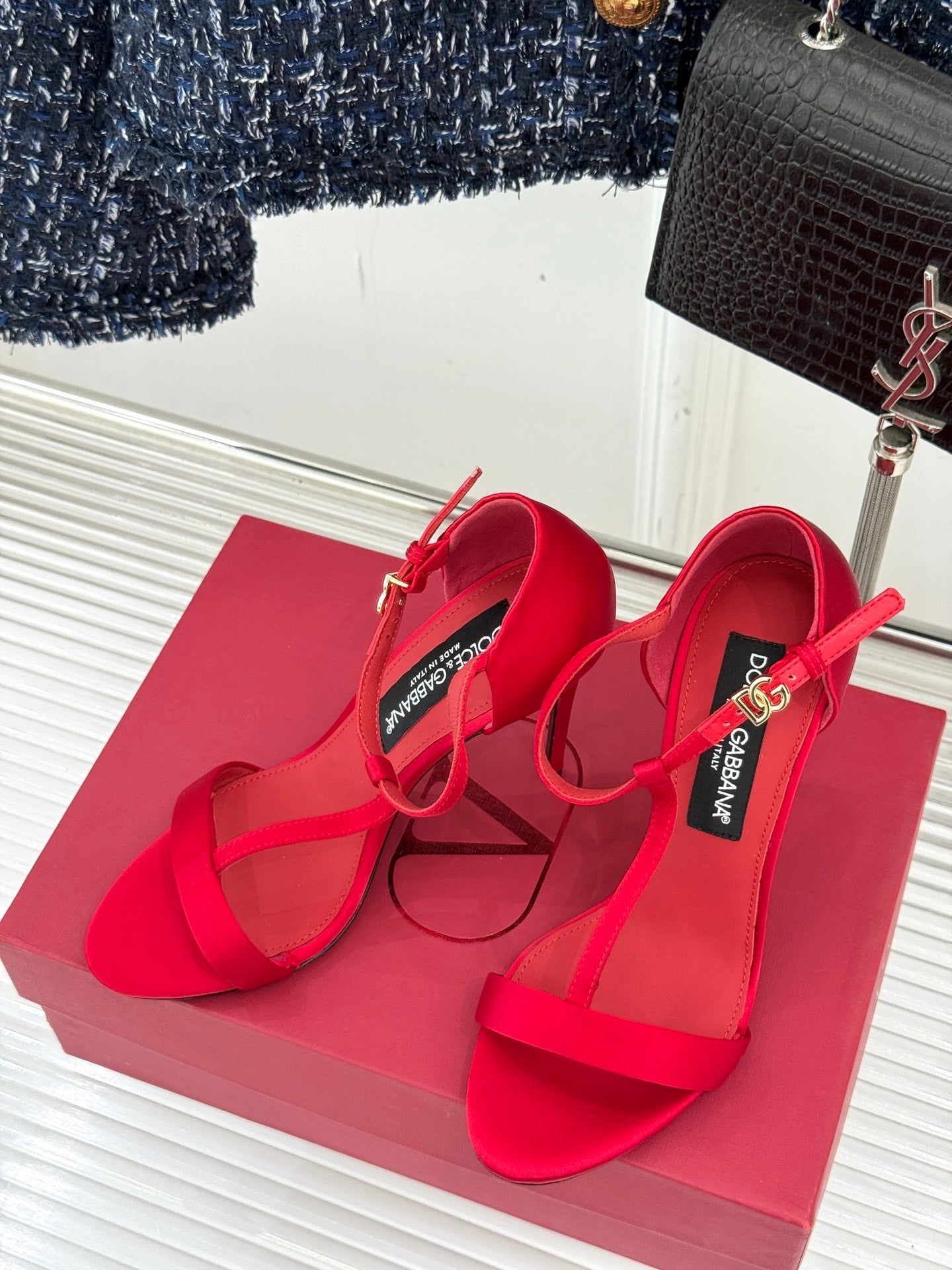BOLD RED STRAPPY HEEL SANDALS WITH STATEMENT SILHOUETTE