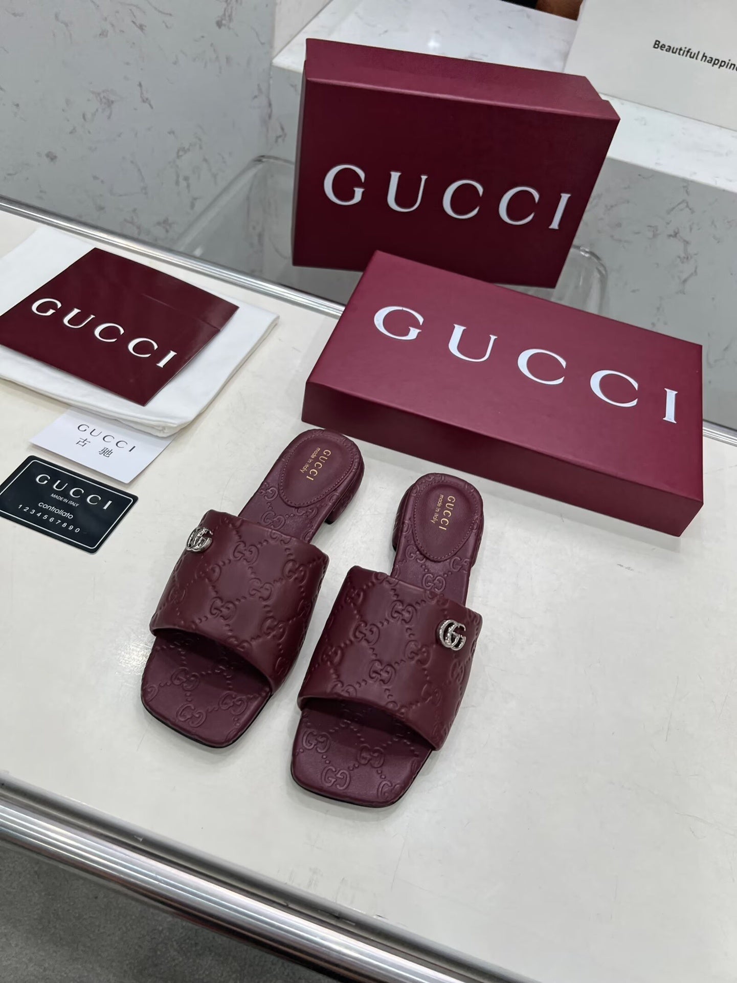 BURGUNDY EMBOSSED LOGO SLIDE SANDALS WITH METAL DETAIL