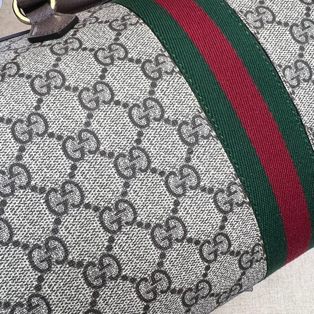 Vintage-Reisetasche aus gestreiftem Canvas