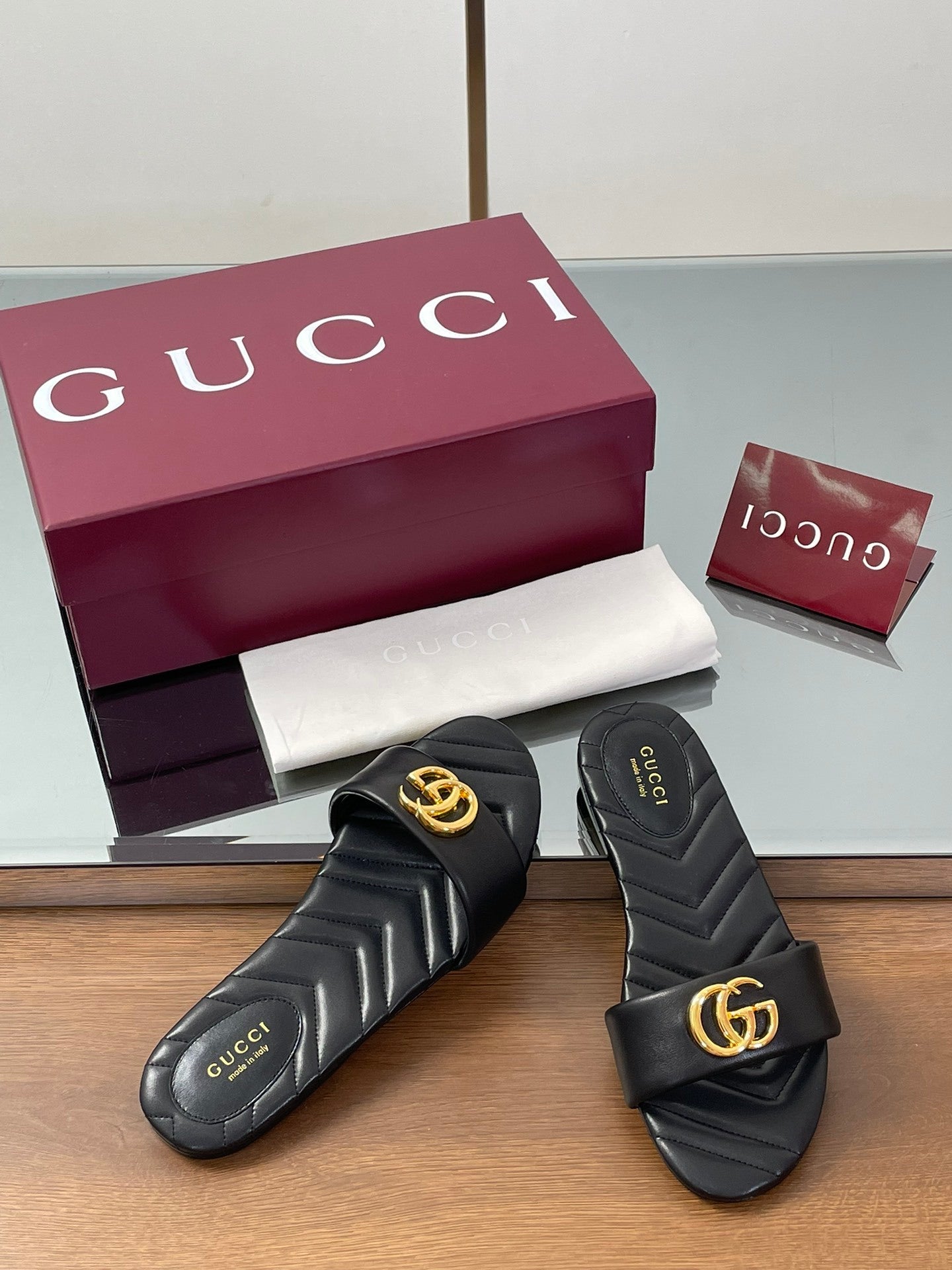 BLACK QUILTED SLIDE SANDALS
