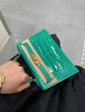 EMERALD GREEN CROCODILE EMBOSSED MINI TOP HANDLE EVENING BAG WITH GOLD HARDWARE