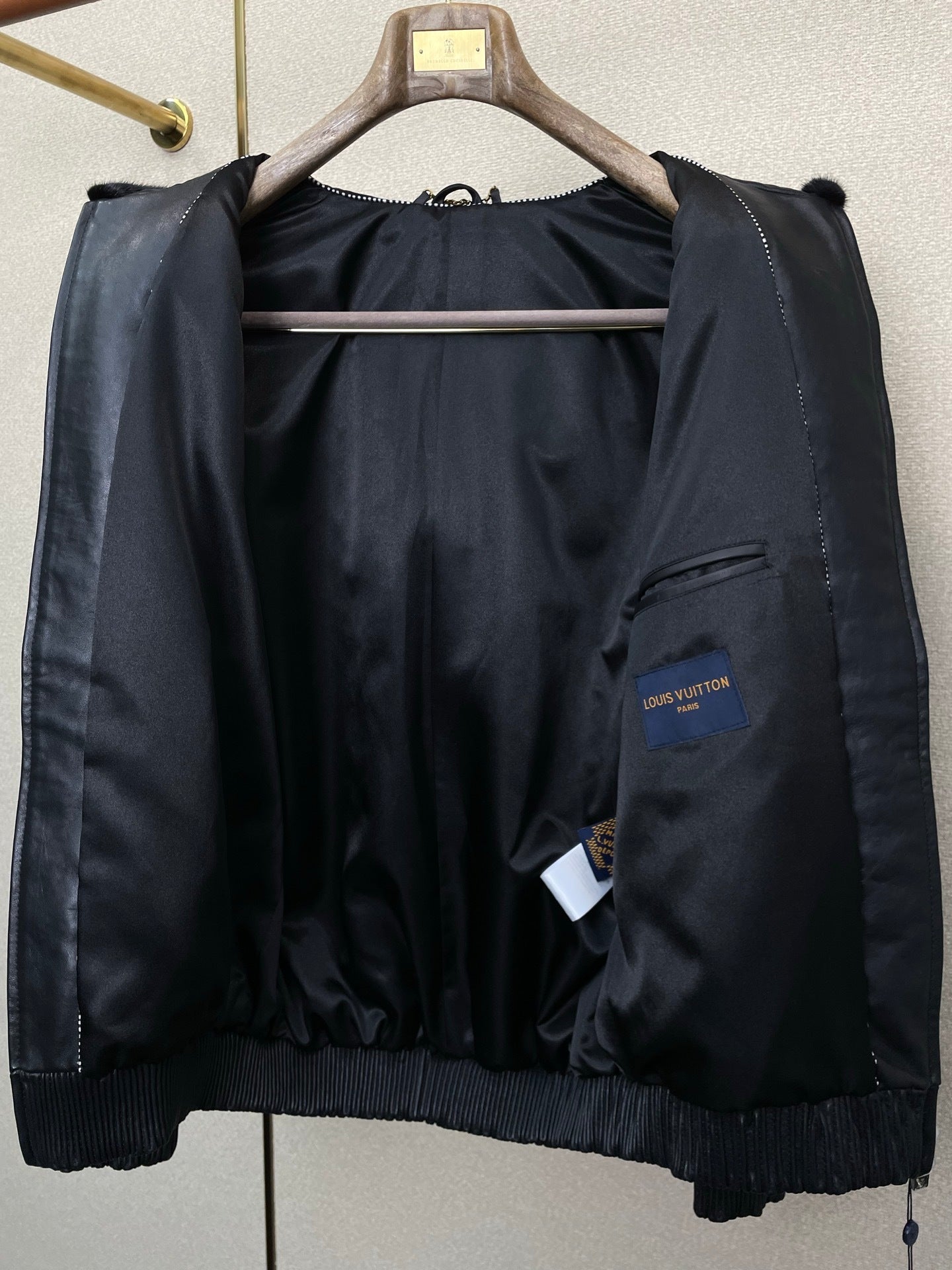 BLACK FAUX FUR HOODED JACKET WITH CONTRAST PATTERN